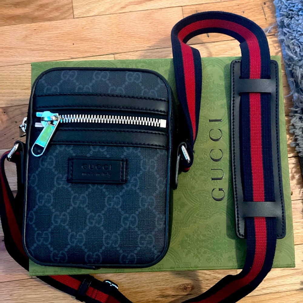 Black Gucci messenger bag